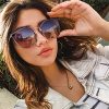 SUNGAIT Femmes Oeil de Chat Lunettes de Soleil Polarisées Vintage Surdimensionné UV-Protection Lunettes de Soleil(Cadre Gris Transparent/Lentille de Gradient Pourpre)
